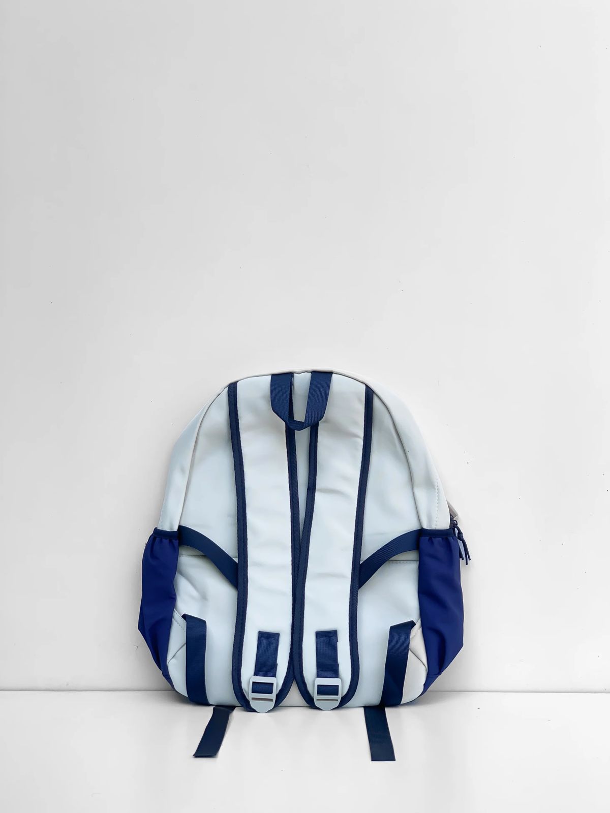Premium Option: DKVNI XIUXIAN Urban Dual-Tone Backpack – Cobalt & Ivory Sporty Option: DKVNI Lightweight Multi-Pocket Casual Daypack Minimalist Option: XIUXIAN Dual-Tone Trendy Explorer Backpack
