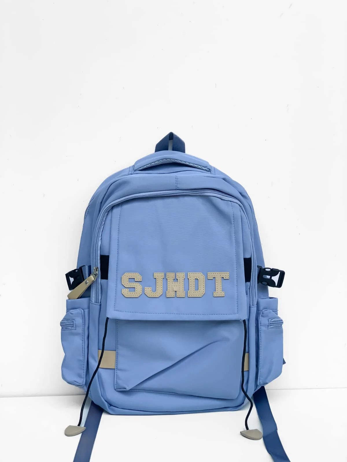 Premium Option: SJHDT Urban Tactical Backpack – Sky Blue & Khaki  Sporty Option: SJHDT Multi-Pocket Utility Daypack  Minimalist Option: SJHDT Series-7 Lightweight Commuter Backpack