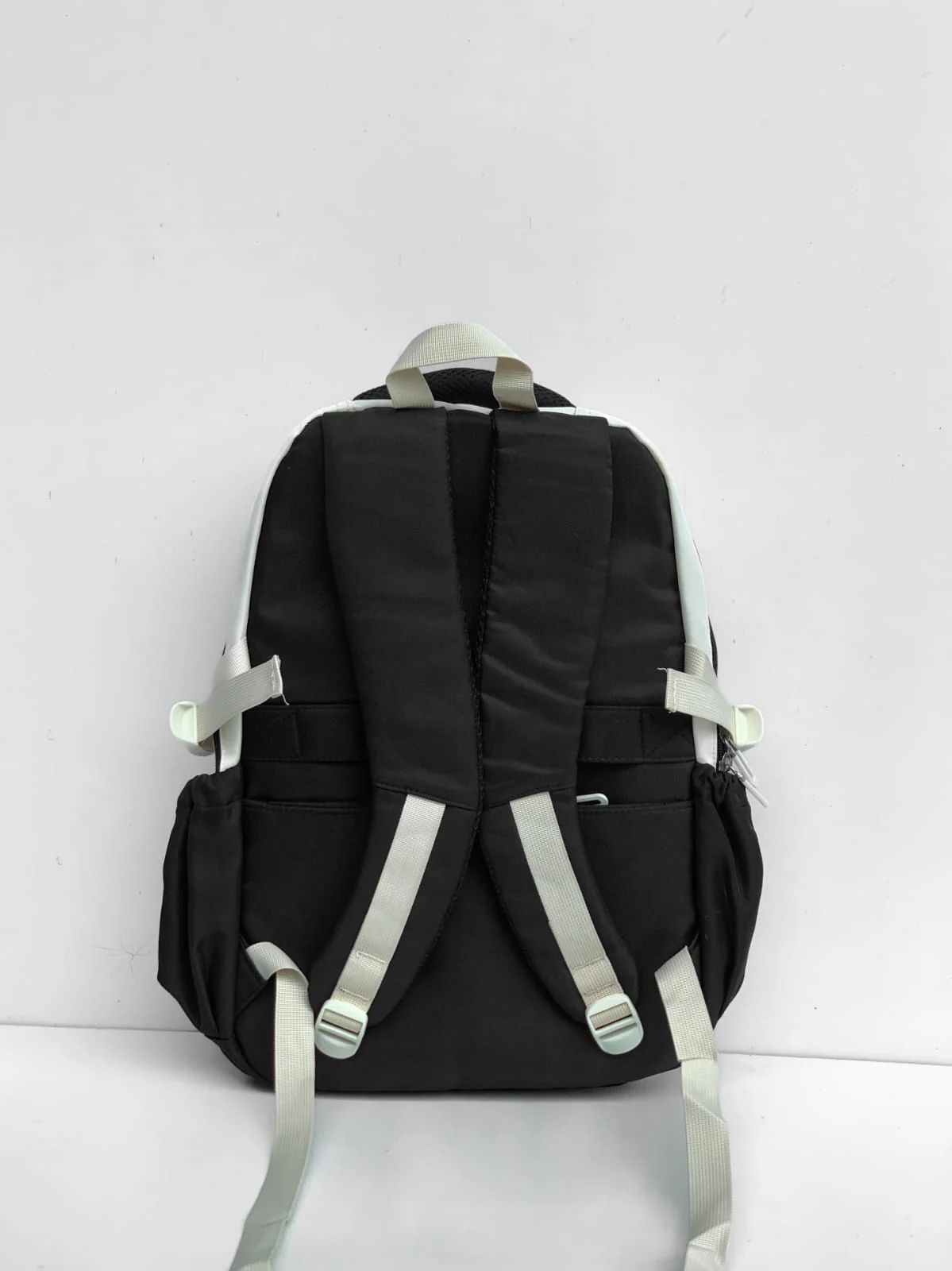 Premium Option: GUIYUBAG Urban Panda Series – Monochromatic Utility Backpack  Sporty Option: GUIYUBAG Multi-Pocket Contrast Daypack (Black & White)  Trend Option: GUIYUBAG Harajuku-Style Streetwear Backpack